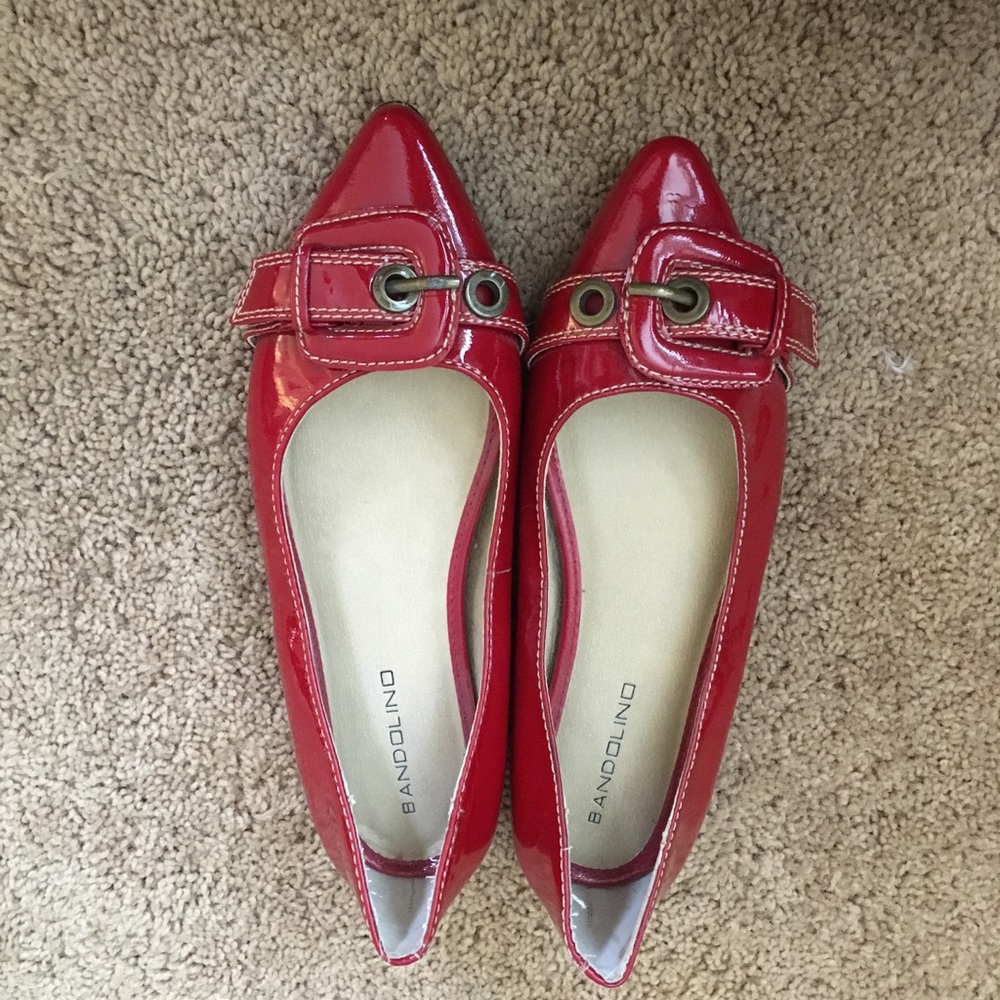 Red pointy toed flats with buckle